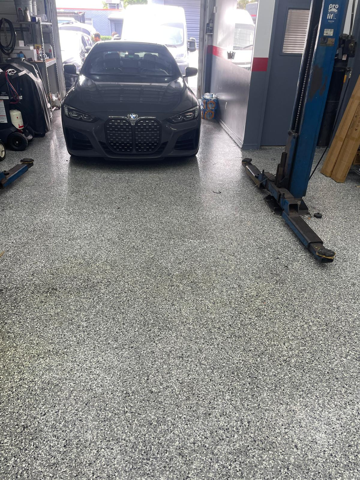 GT Motorworks epoxy floor — After — completed GT Motorworks shop floor