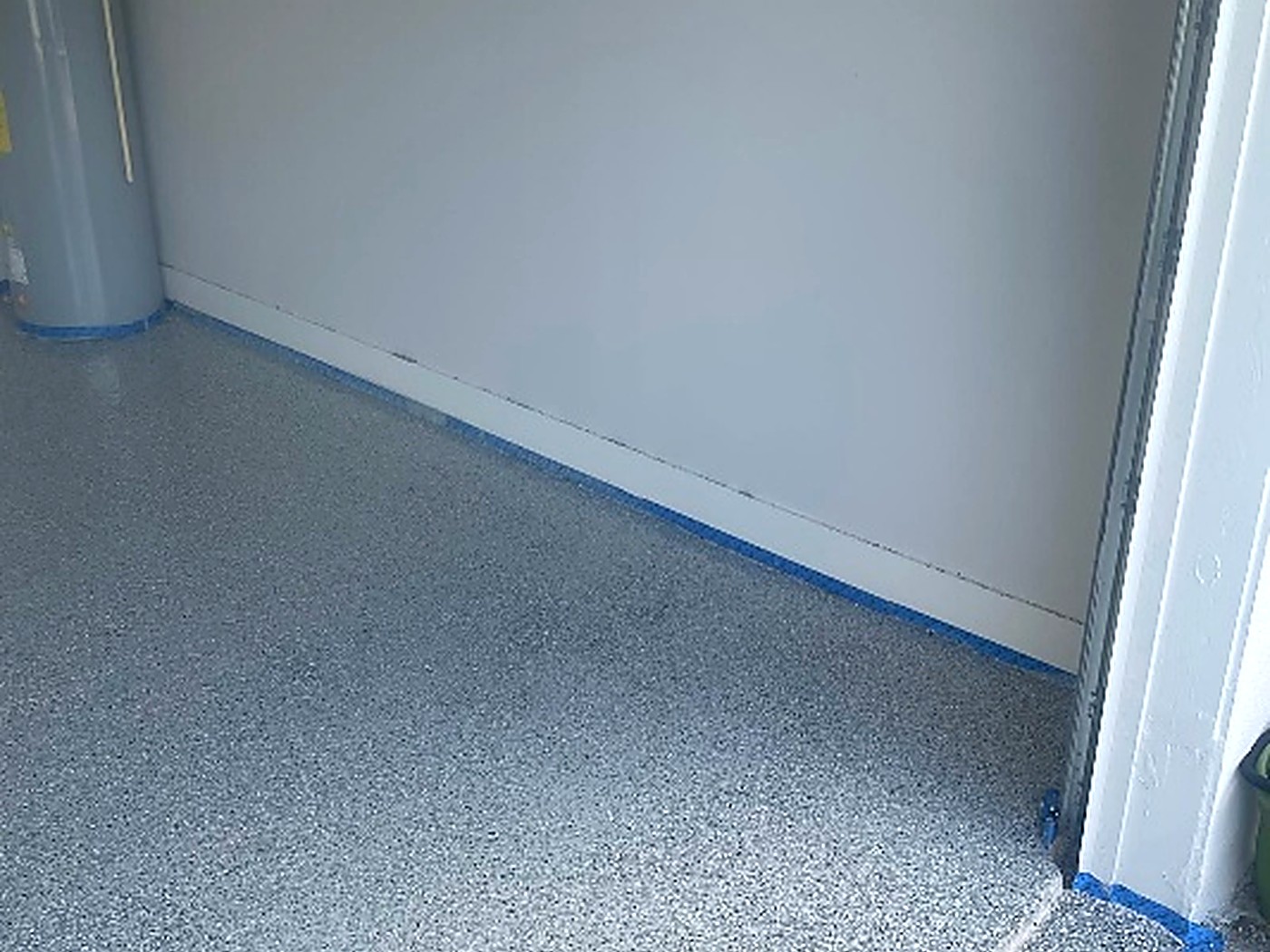 Mrs. C. Garage epoxy floor — After — seamless flake floor with clean cove edges