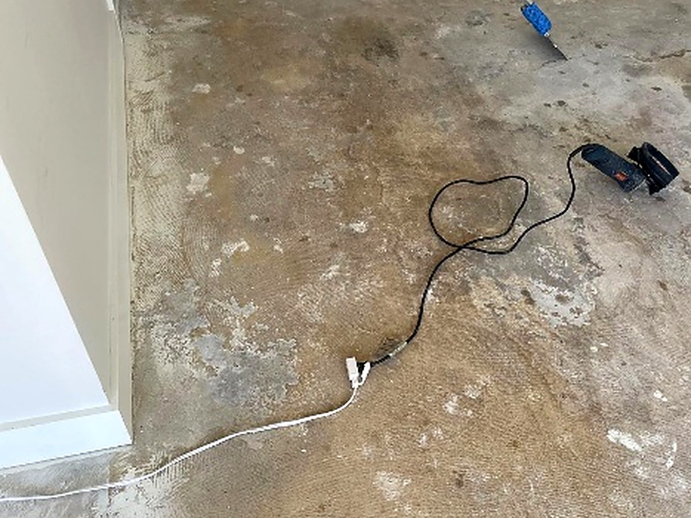 Mrs. C. Garage epoxy floor — Diamond-ground surface prep for a permanent mechanical bond